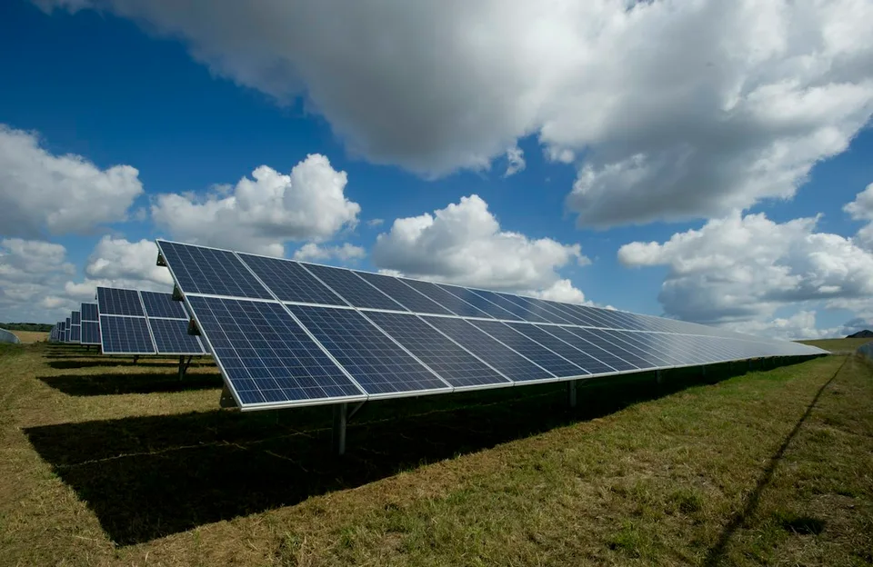 Rows of photovoltaic panels at a solar energy installation