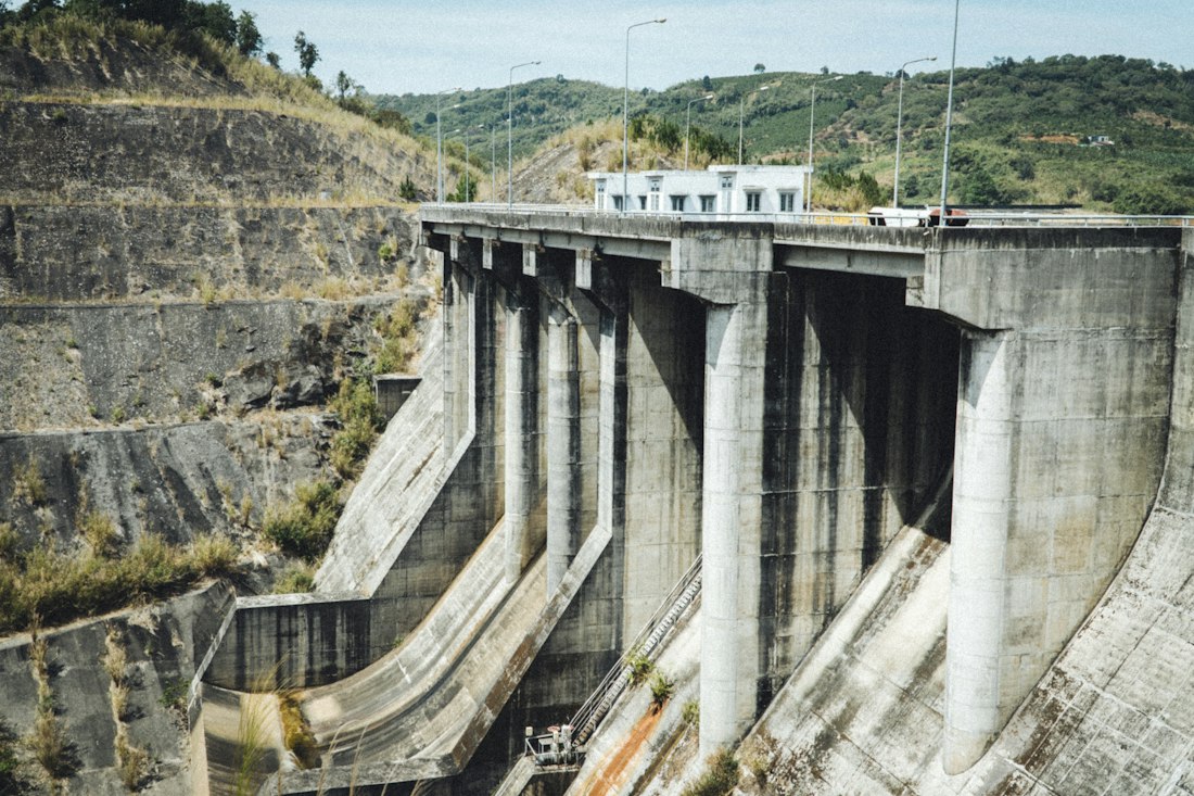 Concrete water infrastructure spanning a mountain valley